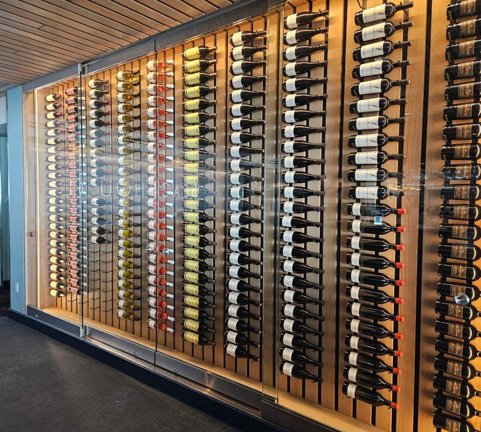 The southern wall of Beach House on Anna Maria Island is lined with wine bottles including various selections by the restaurant’s partner, Lola. Photographed April 10, 2024.