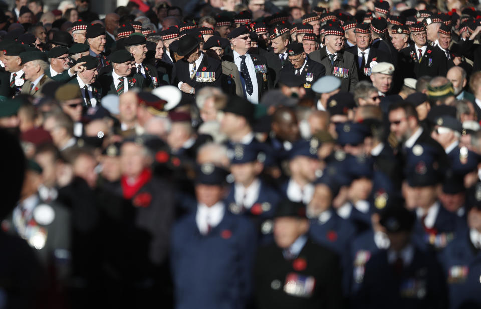 Veterans attend the Remembrance Sunday ceremony at the Cenotaph in London, Sunday, Nov. 11, 2018. Remembrance Sunday is held each year to commemorate the service men and women who fought in past military conflicts. 2018 marks the centenary of the armistice and cessation of hostilities in WWI, which ended on the eleventh hour of the eleventh day of the eleventh month,1918. (AP Photo/Alastair Grant)