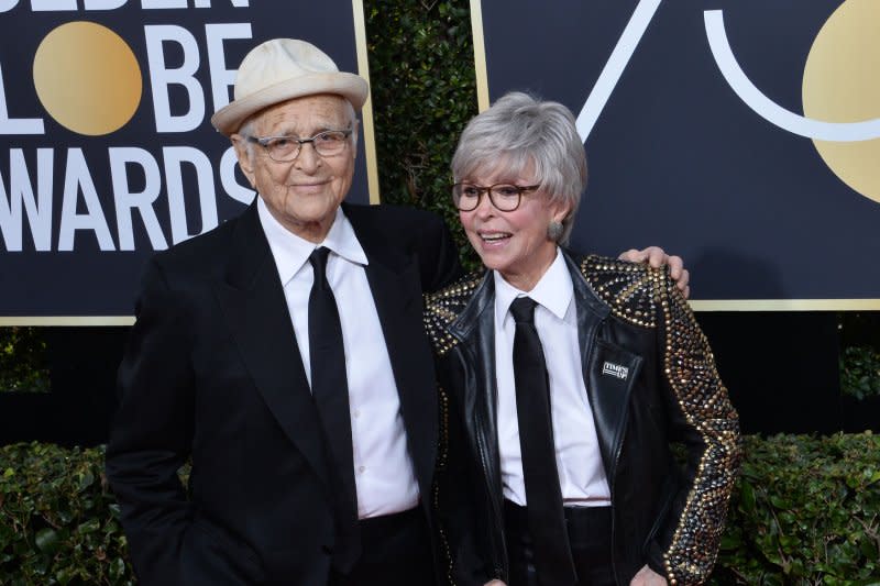 Norman Lear (L) and Rita Moreno attend the Golden Globe Awards in 2018. File Photo by Jim Ruymen/UPI