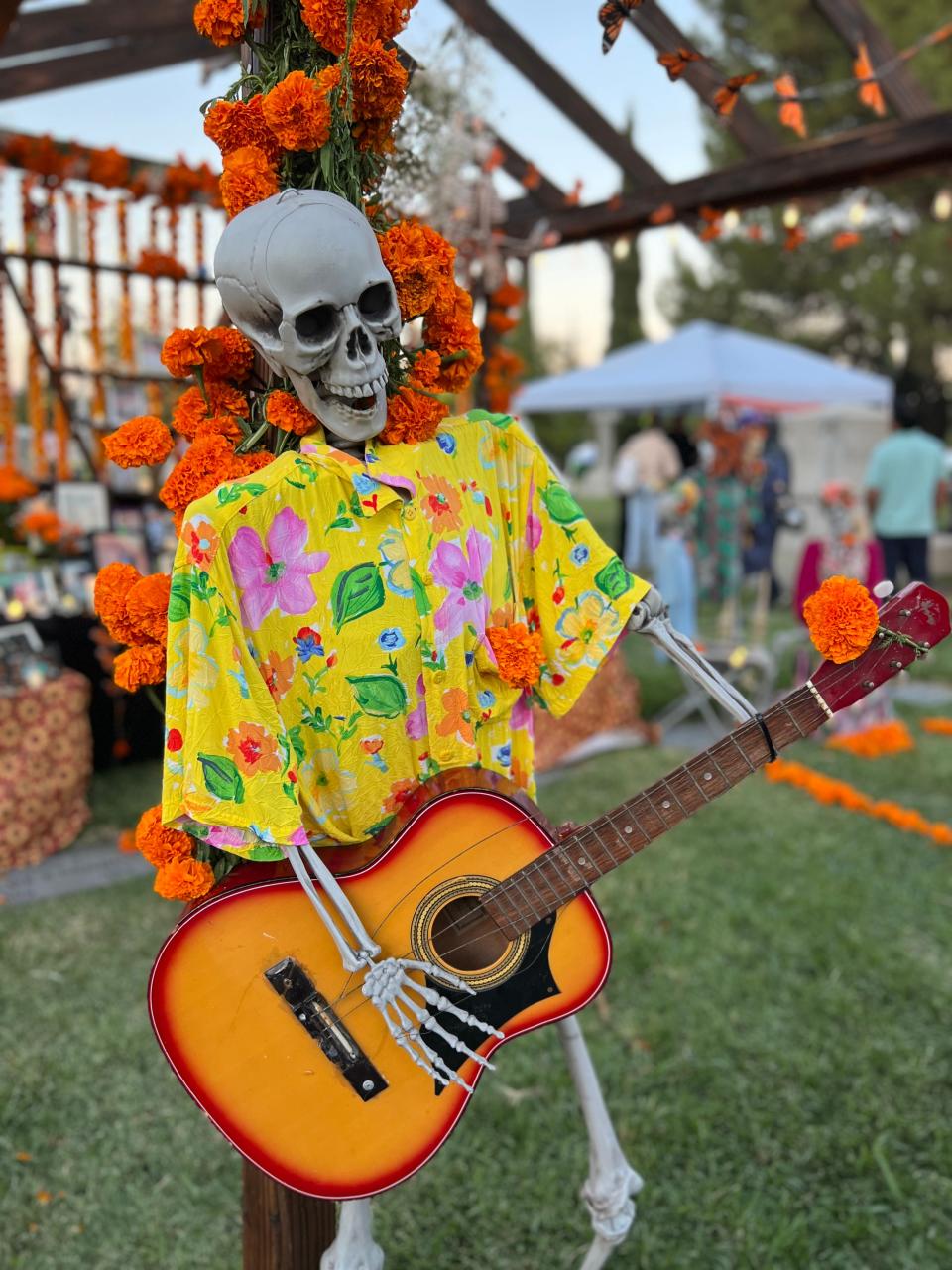 A guitar-playing skeleton is displayed at the Día de Los Muertos celebration at the Hollywood Forever Cemetery in Los Angeles on Saturday, Oct. 28, 2023.