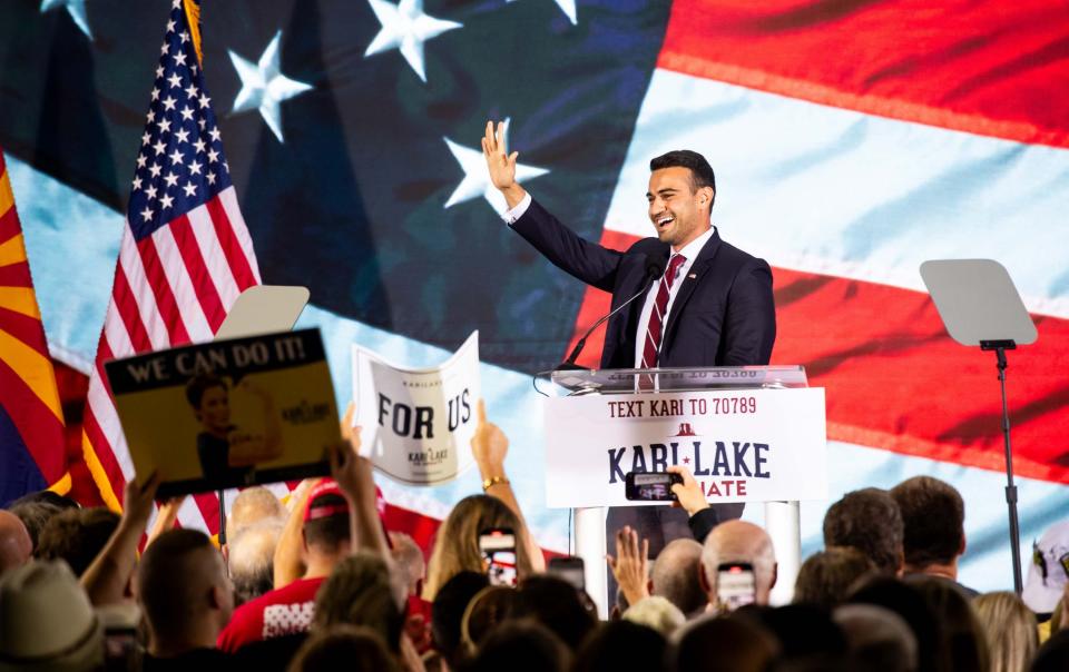 Abe Hamadeh greets the audience at Kari Lake's announcement rally at Jetset Magazine in Scottsdale on Oct. 10, 2023.