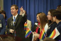 Kentucky Gov. Andy Beshear speaks at a rally held by Fairness Campaign to advance LGBTQ rights, Wednesday, Feb. 19, 2020, in the Rotunda at the State Capitol in Frankfort, Ky. (AP Photo/Bryan Woolston)