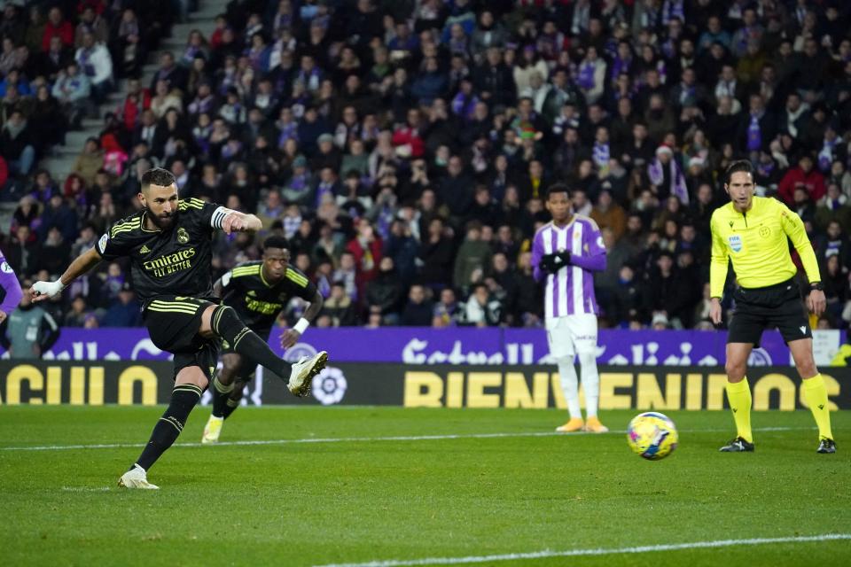 Real Madrid's French forward Karim Benzema scores his team's first goal from the penalty spot during the Spanish League football match between Real Valladolid FC and Real Madrid CF at the Jose Zorilla stadium in Valladolid on December 30, 2022. (Photo by CESAR MANSO / AFP) (Photo by CESAR MANSO/AFP via Getty Images)