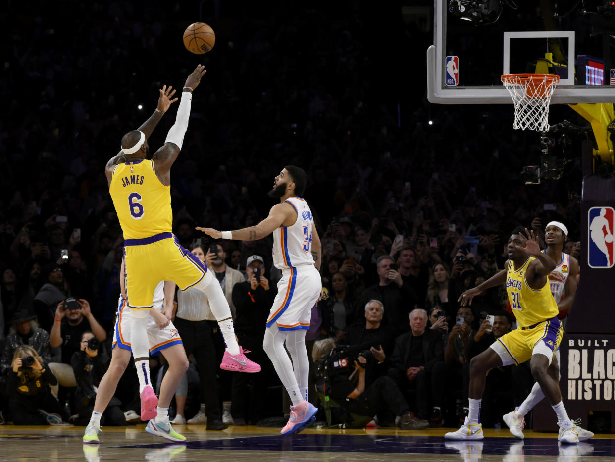 Phil Knight sat calmly with his hands in his lap while every other person tried to record the moment LeBron James became the NBA's all-time scoring leader on Tuesday night. 