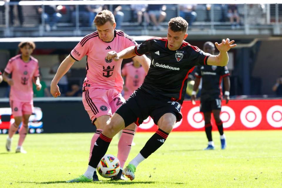 Mar 16, 2024; Washington, District of Columbia, USA; Inter Miami CF midfielder Julian Gressel (24) defends against D.C. United defender Christopher McVey (97) during the first half at Audi Field. Mandatory Credit: Amber Searls-USA TODAY Sports