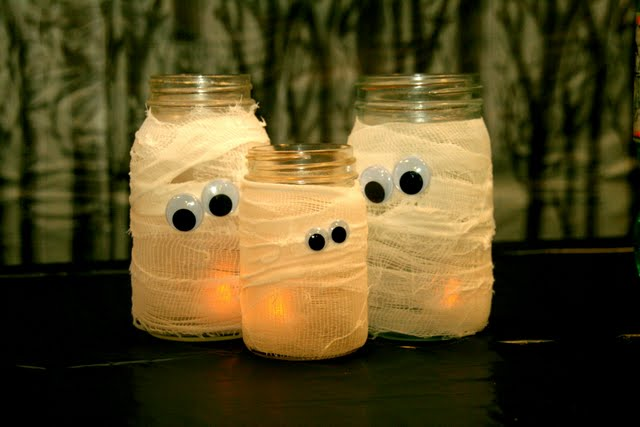 Googly eyed mummy candles