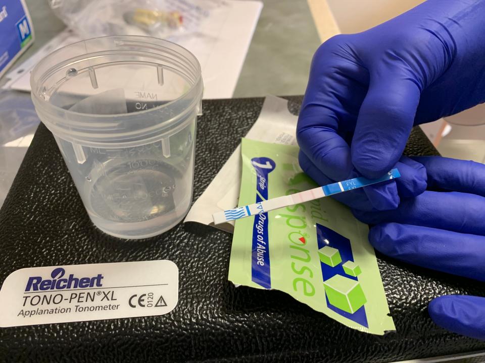 Dr. Sandra Gibney demonstrates how a fentanyl testing strip test works at St. Francis Hospital in Wilmington. She conducted a study to determine how often fentanyl was present in emergency room patients.