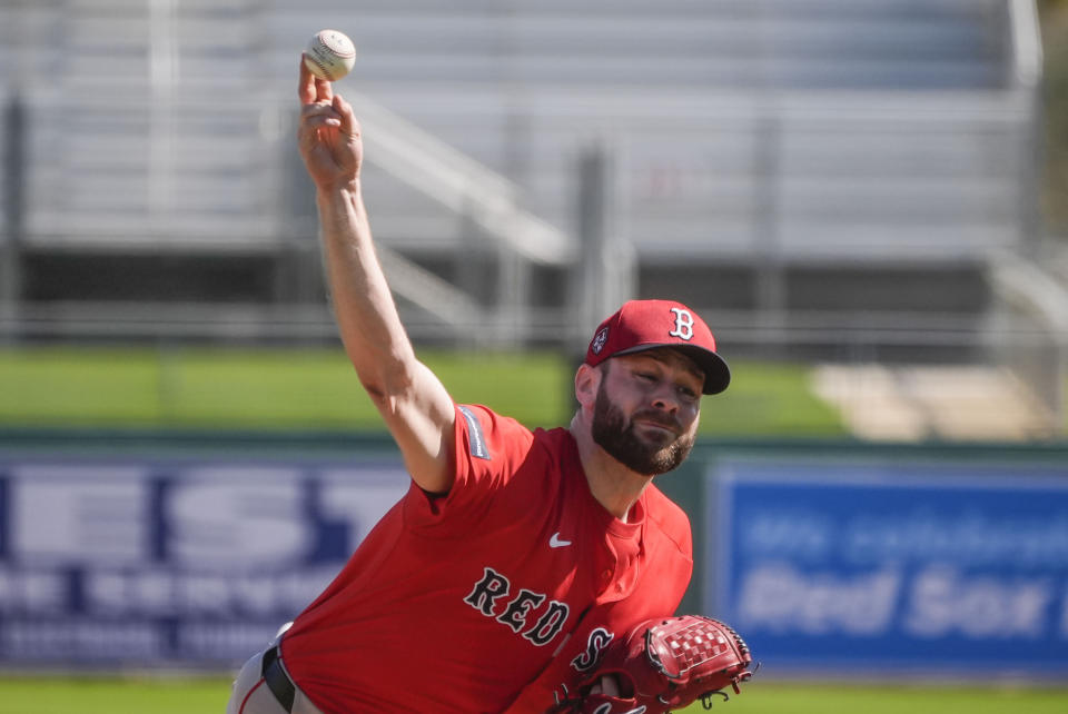 Red Sox pitcher Lucas Giolito works out during spring training in Fort Myers, Fla., Thursday, Feb. 15, 2024. (AP Photo/Gerald Herbert)