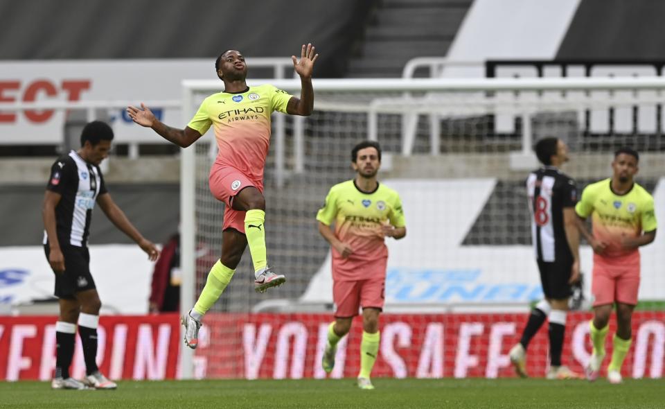 Manchester City's Raheem Sterling celebrates after scoring his side's second goal during the FA Cup sixth round soccer match between Newcastle United and Manchester City at St. James' Park in Newcastle, England, Sunday, June 28, 2020. (Shaun Botterill/Pool via AP)