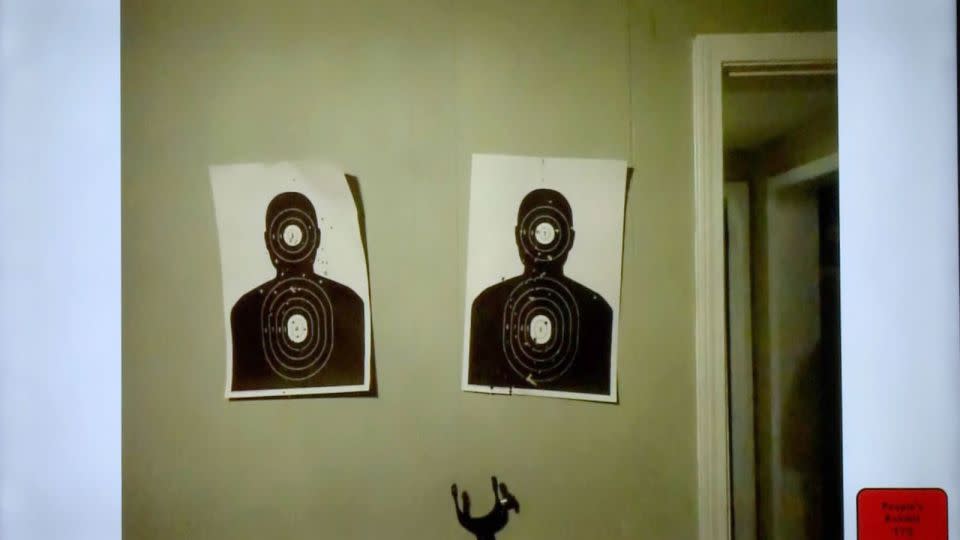Two bullet-riddled gun range targets were affixed to the wall in Ethan's room. - Pool/WWJ/WXYZ