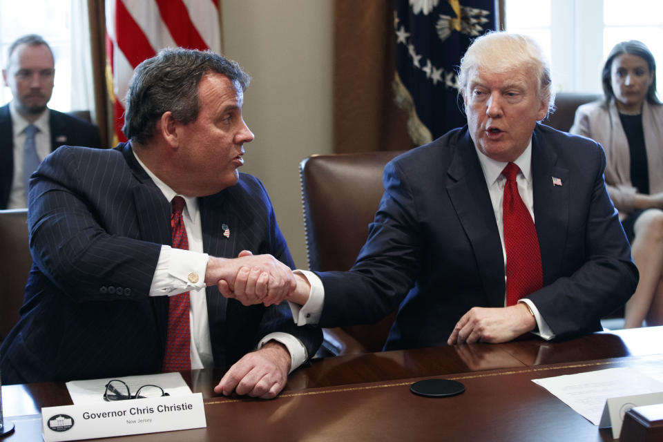 President Donald Trump shakes hands with New Jersey Gov. Chris Christie during an opioid and drug abuse listening sessionWednesday, March 29, 2017, in the Cabinet Room of the White House in Washington. (AP Photo/Evan Vucci)