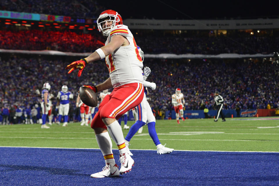 Kansas City Chiefs tight end Travis Kelce (87) reacts after scoring a touchdown against the Buffalo Bills during the second quarter of an NFL AFC division playoff football game, Sunday, Jan. 21, 2024, in Orchard Park, N.Y. (AP Photo/Adrian Kraus)