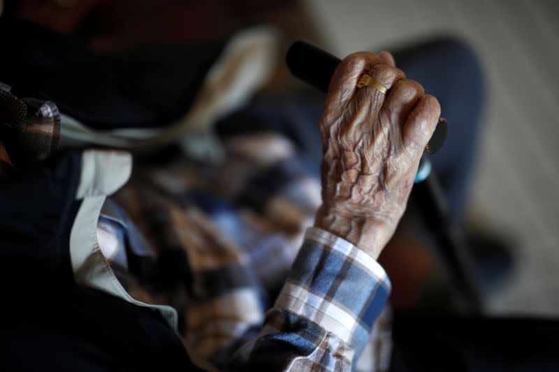 A resident is seen with a walking stick at the Emile Gerard retirement home (EHPAD - Housing Establishment for Dependant Elderly People) in Livry-Gargan