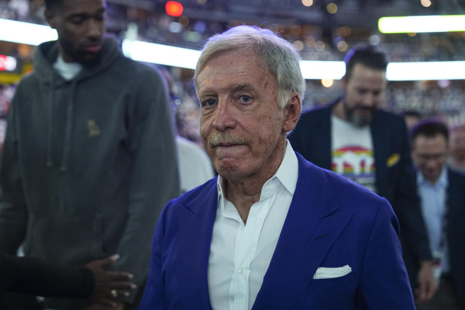 Denver Nuggets owner Stan Kroenke stands courtside before Game 5 of basketball's NBA Finals between the Nuggets and the Miami Heat, Monday, June 12, 2023, in Denver. (AP Photo/Jack Dempsey)