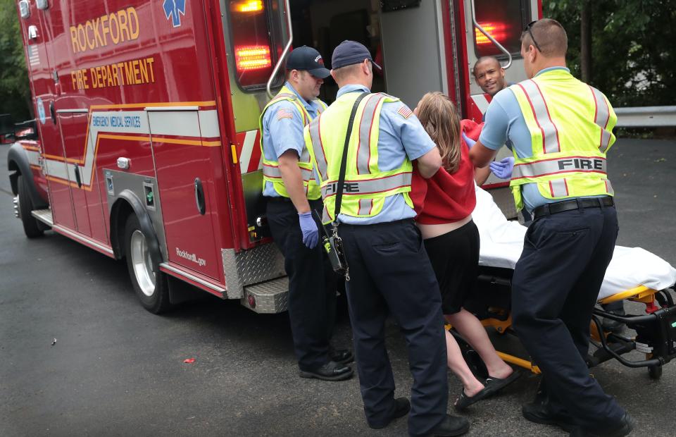 Firefighters help an overdose victim on July 14, 2017 in Rockford, Illinois. (Photo: Scott Olson/Getty Images)