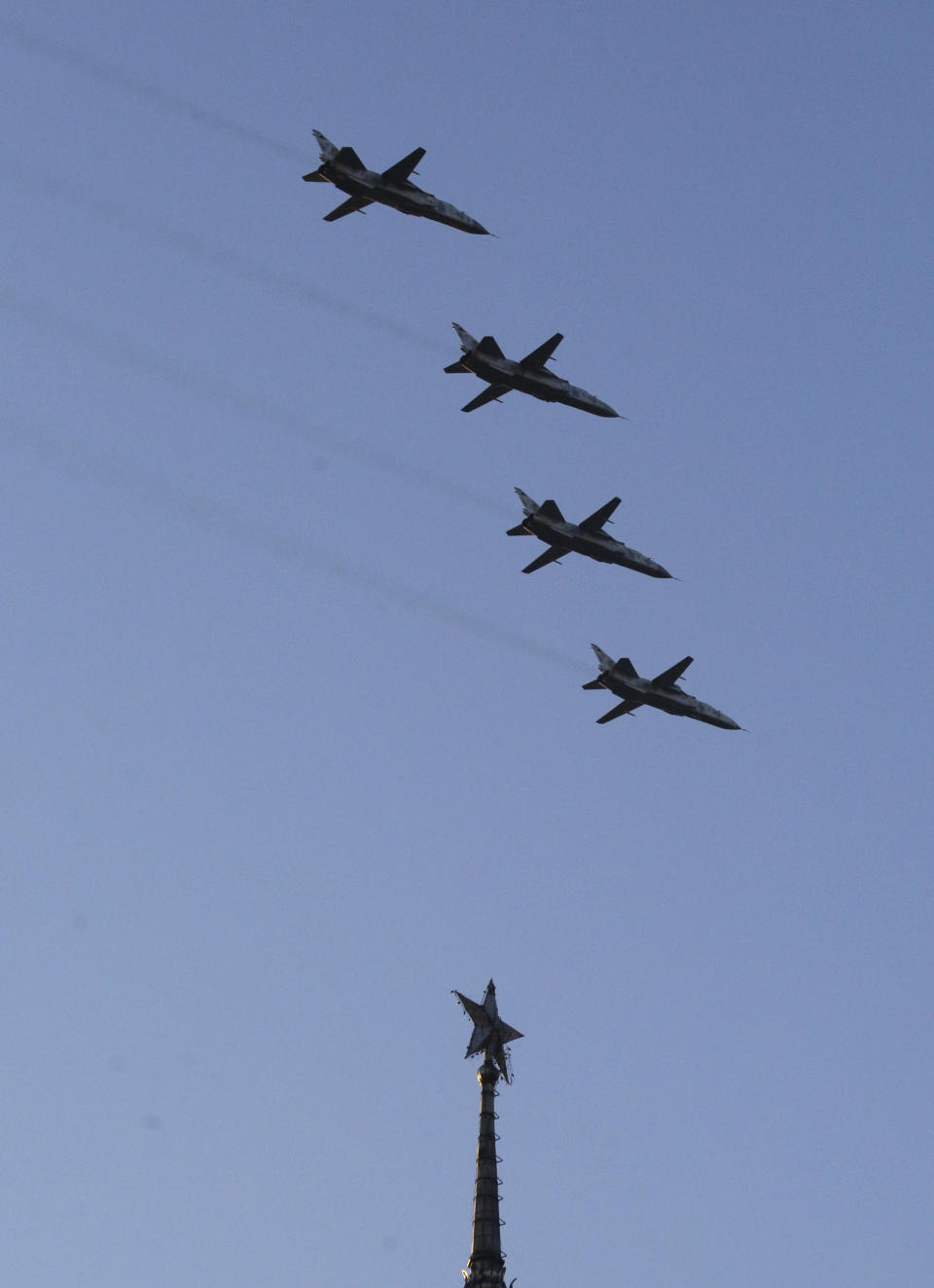 Jet fighters practice above the city centre during a rehearsal for the Independence Day military parade in Kiev, Ukraine, Wednesday, Aug. 22, 2018. Ukraine to mark the 27th anniversary of the Independence Day on Aug. 24. (AP Photo/Efrem Lukatsky)