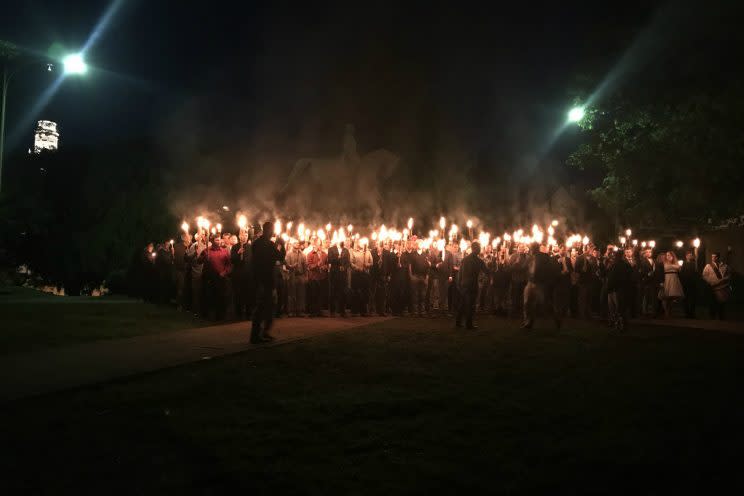 Torch-bearing protesters gather at Lee Park in Charlottesville, Va., on Saturday. (Allison Wrabel/The Daily Progress via ABC News)