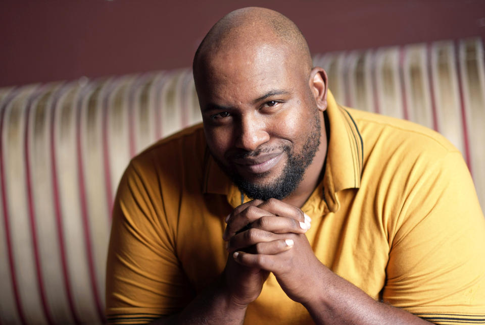 Author LaDarrion Williams poses for a portrait in Los Angeles on Thursday, April 25, 2024, to promote his book "Blood at the Root." (AP Photo/Chris Pizzello)