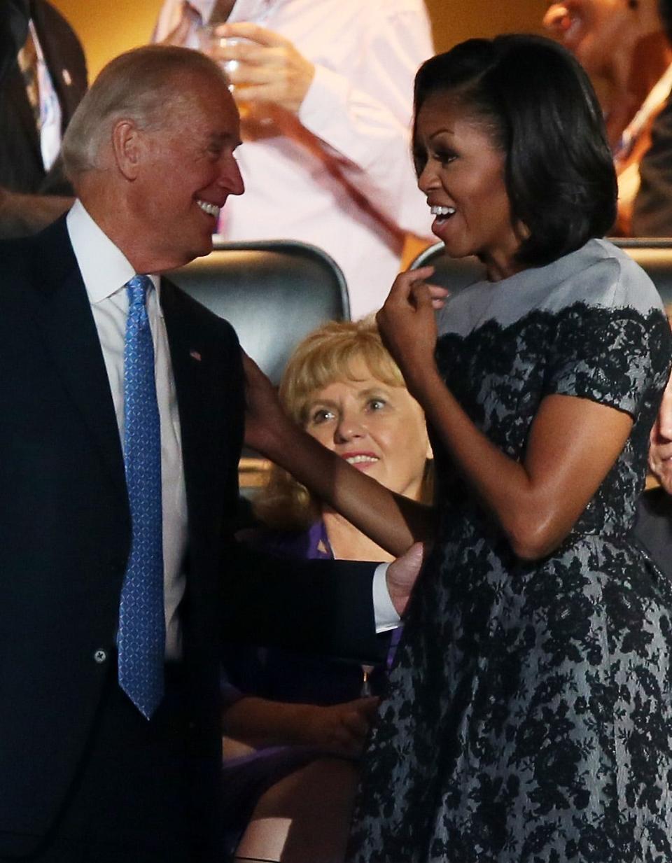 Michelle Obama talks to Joe Biden at the 2012 Democratic National Convention.