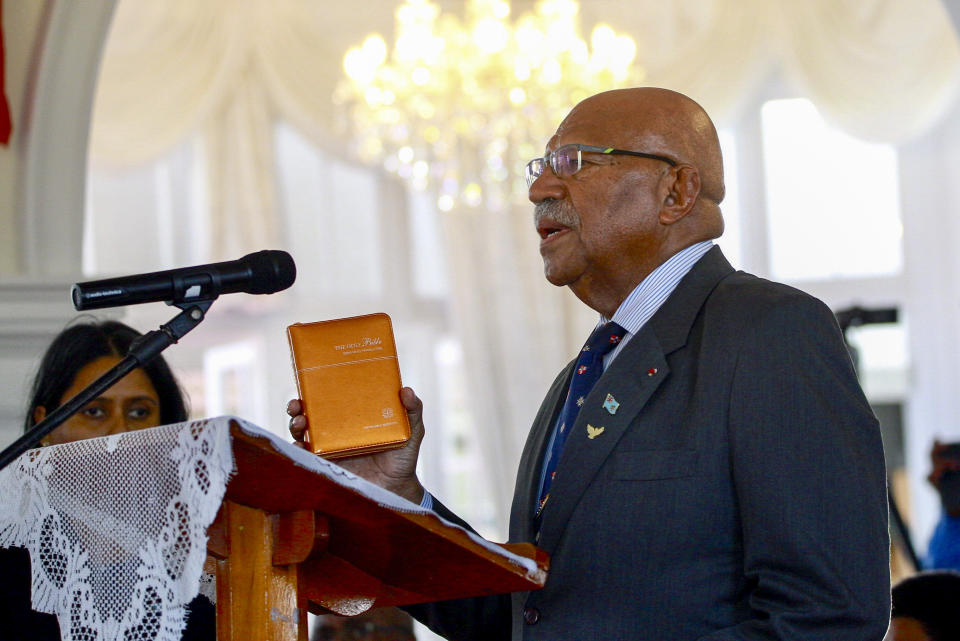 Sitiveni Rabuka is sworn in as the prime minister of Fiji in Suva, Saturday, Dec. 24, 2022. Rabuka has been confirmed as Fiji's next prime minister more than two decades after the former military commander first held the office in a term lasting nearly seven years. (Leon Lord/Fiji Sun via AP)