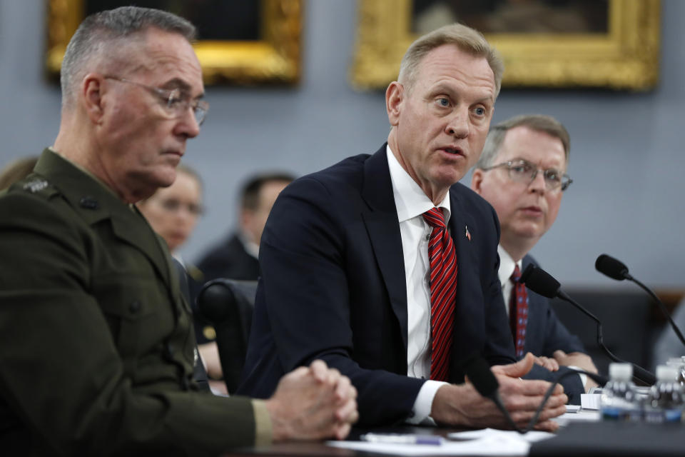 Joint Chiefs of Staff Chairman Gen. Joseph Dunford, left, Acting Defense Secretary Patrick Shanahan, and Acting Deputy Secretary of Defense David Norquist, testify, Wednesday May 1, 2019, to a House Appropriations subcommittee on budget hearing on Capitol Hill in Washington. (AP Photo/Jacquelyn Martin)