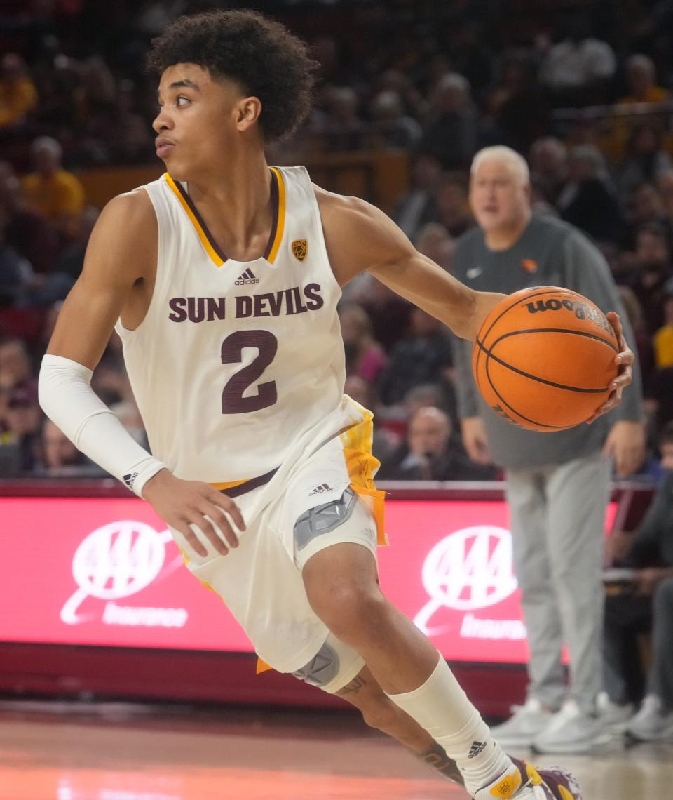 Arizona State Sun Devils guard Austin Nunez (2) brings the ball up court against the Oregon State Beavers at Desert Financial Arena in Tempe on Feb. 2, 2023