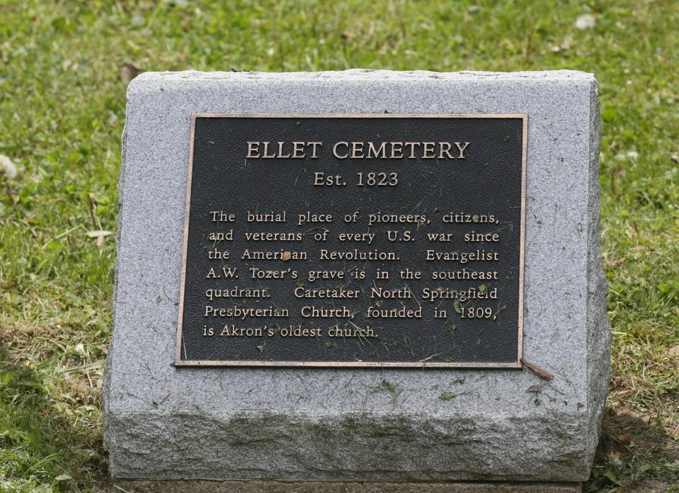 A plaque give the history of Ellet Cemetery, which was established in 1823 in what is now Akron.