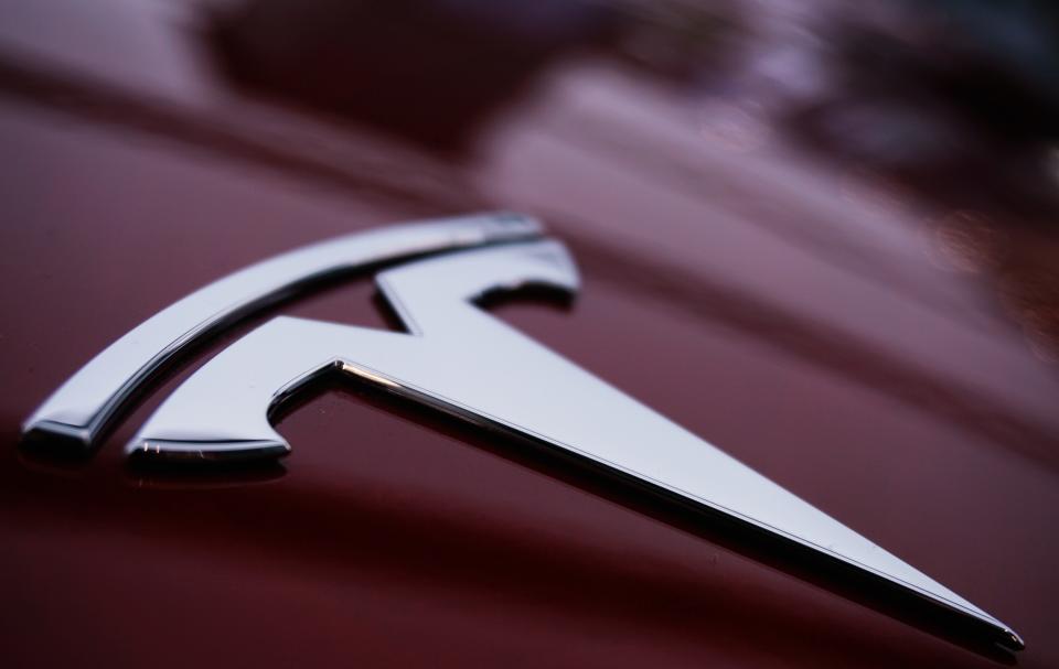 HANGZHOU, CHINA - JUNE 19, 2022 - A Tesla logo is pictured in Hangzhou, East China's Zhejiang Province, June 19, 2022. Tesla has raised prices for electric cars by a large margin. (Photo credit should read CFOTO/Future Publishing via Getty Images)