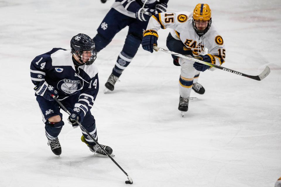 East Grand Rapids forward Nolan Brooks looks to pass against East Grand Rapids during the second period of MHSAA Division 3 hockey final at USA Hockey Arena in Plymouth on Saturday, March 9, 2024.