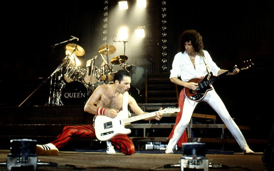 May on stage with Freddie Mercury and Queen in 1982 - REX/Shutterstock