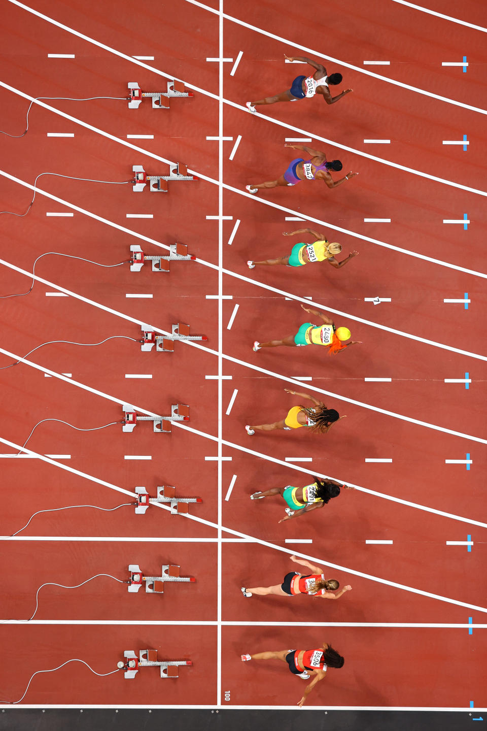 <p>TOKYO, JAPAN - JULY 31: Runners compete in the Women's 100m Final on day eight of the Tokyo 2020 Olympic Games at Olympic Stadium on July 31, 2021 in Tokyo, Japan. (Photo by Richard Heathcote/Getty Images)</p> 