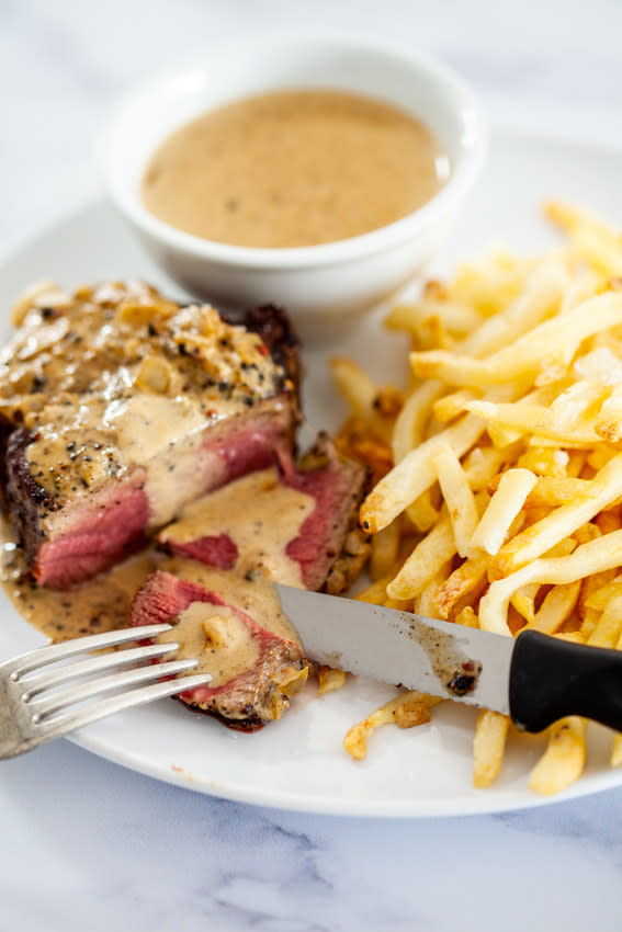 Steak au poivre with fries.
