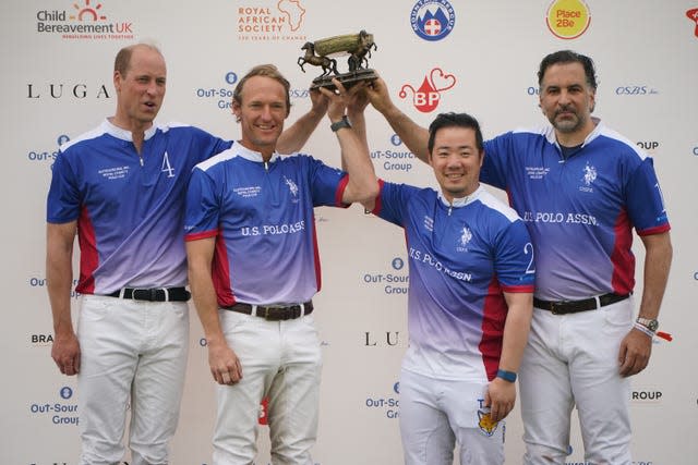 The Prince of Wales and his teammates (left to right) Mark Tomlinson, Aiyawatt Srivaddhanaprabha and Amr Zedan 