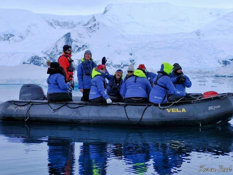 On of my Antarctic buds, Ashley, standing on the zodiac after being given permission by our guide.