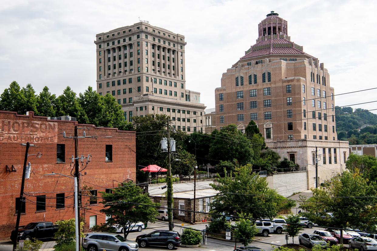 A view of the Buncombe County Courthouse, left, and Asheville City Hall from the Asheville Police Department July 13, 2022.