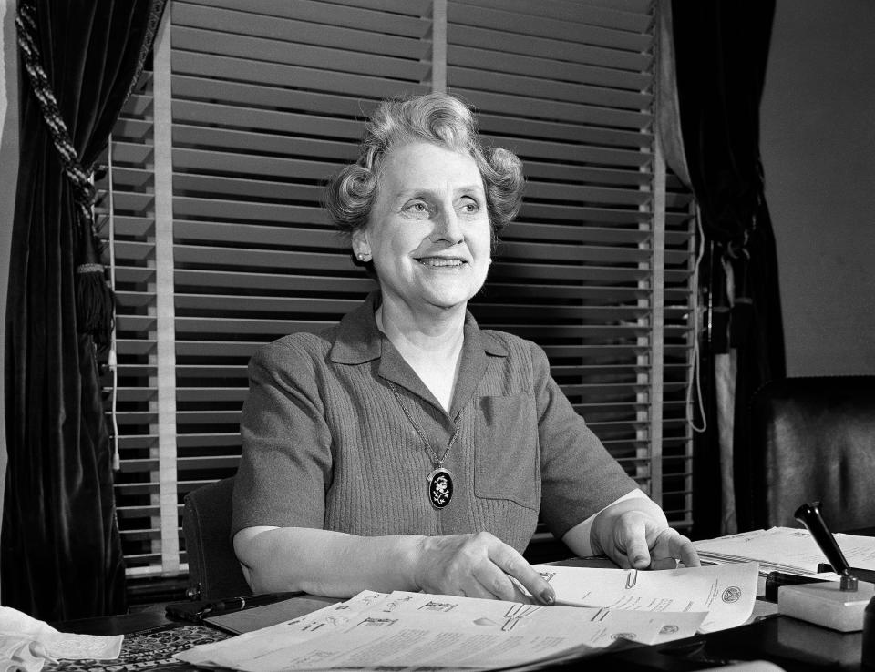 Nellie Tayloe Ross Director of the bureau of the Mint at her desk on May 1, 1942 in Washington where she supervises the turning out of the billions of coins needed for the defense effort.