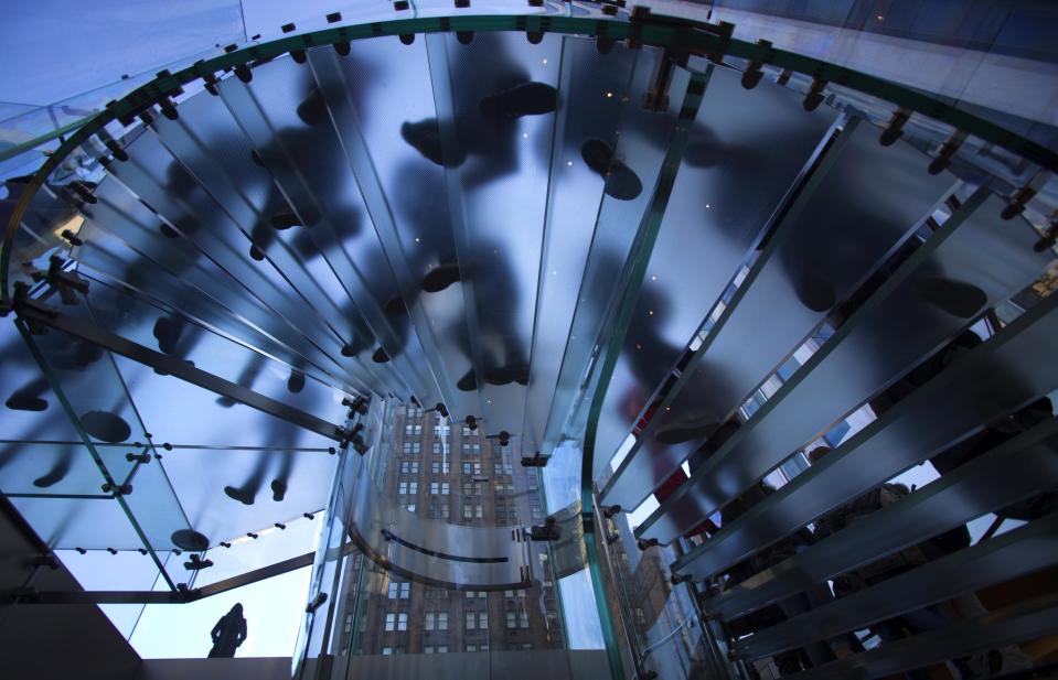 Shoppers are pictured inside an Apple store on 5th Ave during Black Friday Sales in New York