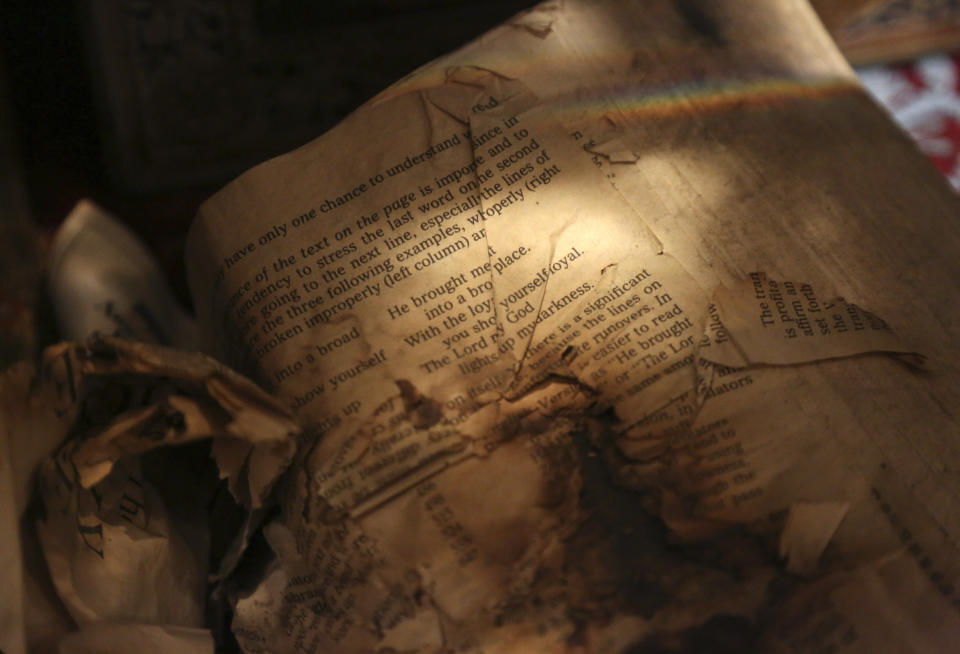 A charred Bible recovered from the original St. Nicholas Greek Orthodox Church, destroyed in the Sept. 11, 2001 attacks, is preserved at the Greek Orthodox Archdiocese of America in New York on Wednesday, Aug. 18, 2021. (AP Photo/Jessie Wardarski)