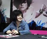 Kelly Osbourne makes an in store appearance to mark the release of her new CD "Shut Up!" at Tower Records in Los Angeles November 30, 2002. [The second season opener of MTV's hit reality series "The Osbourne's," which features Kelly, her brother Jack and their parents Ozzy and Sharon, drew an average of 6.6 million viewers, making it the most watched cable TV program of the night, the network said November 26.]