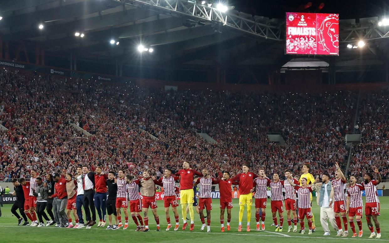 Olympiacos players celebrate