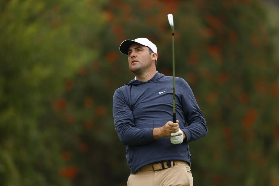 Scottie Scheffler hits from the fourth tee during the third round of the Genesis Invitational golf tournament at Riviera Country Club, Saturday, Feb. 17, 2024, in the Pacific Palisades area of Los Angeles. (AP Photo/Ryan Kang)