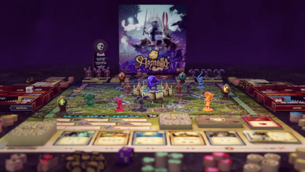  Armello: The Board Game box, board, miniatures, tokens, and cards laid out in a game. 