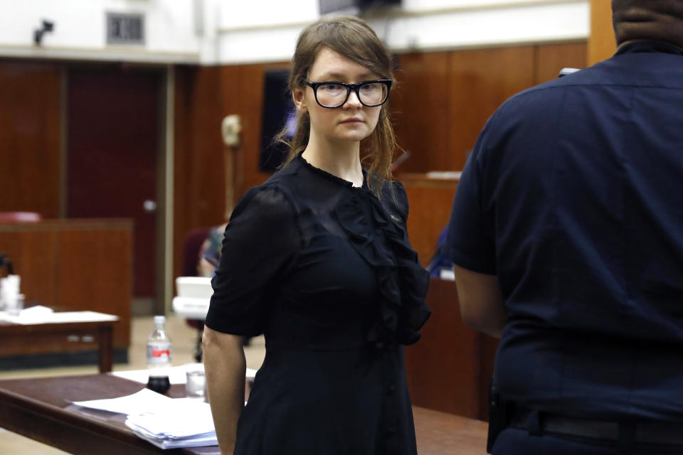 Anna Sorokin leaves the courtroom during the lunch break of her trial at New York State Supreme Court on April 25, 2019. Sorokin, who claimed to be a German heiress, was on trial on grand larceny and theft of services charges. (AP Photo/Richard Drew) - Credit: AP