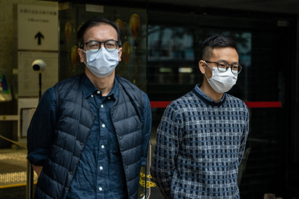 (Left) Former Chief Editor of Stand News Chung Pui-kuen and (Right) Former Acting Chief Editor of Stand News Patrick Lam posing for a photo in front of the Wan Chai District Court on December 13, 2022 in Hong Kong, China. Stand News Chief Editor Chung Pui-kuen was released on cash bail for HK$100,000, Cheung was arrested Last Year when police raided the office of online media outlet Stand News. (Photo by Vernon Yuen/NurPhoto via Getty Images)