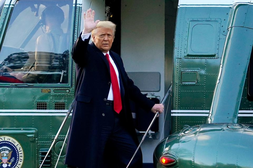 FILE - In this Wednesday, Jan. 20, 2021, file photo, President Donald Trump waves as he boards Marine One on the South Lawn of the White House, in Washington, en route to his Mar-a-Lago Florida Resort. Former President Trump has named two lawyers to his impeachment defense team, one day after it was revealed that the former president had parted ways with an earlier set of attorneys. (AP Photo/Alex Brandon, File) ORG XMIT: NYSB701