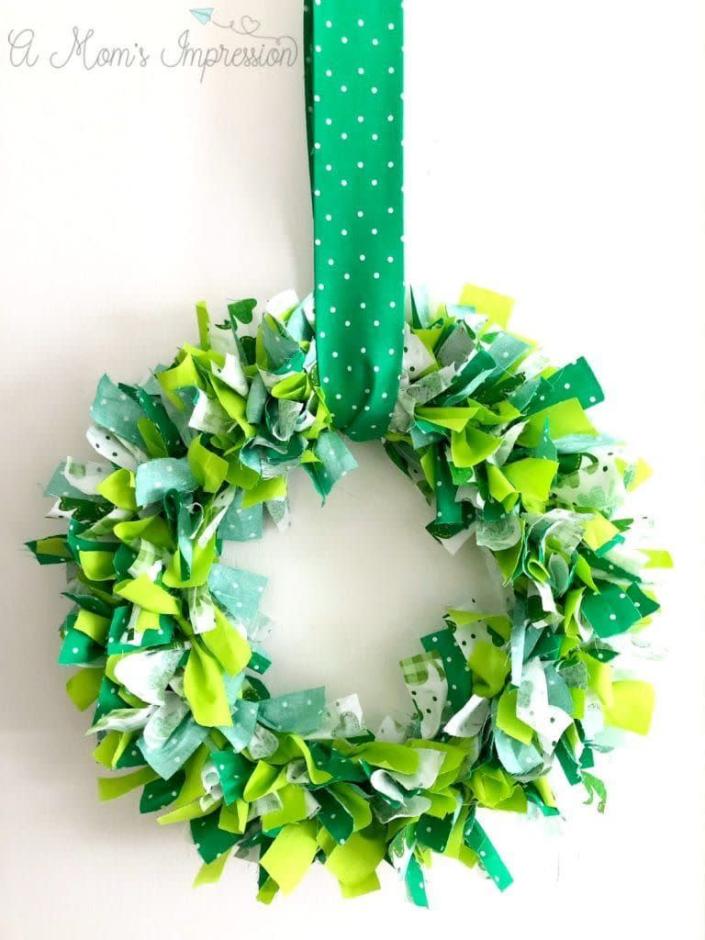 <p>Even newbie DIYers should be able to craft this adorable wreath, since the only skill it takes to make it is the ability to tie fabric into knots.</p><p><strong>Get the tutorial at <a href="https://amomsimpression.com/how-to-make-a-shamrock-wreath/" rel="nofollow noopener" target="_blank" data-ylk="slk:A Mom's Impression" class="link ">A Mom's Impression</a>.</strong></p><p><a class="link " href="https://www.amazon.com/Shamrock-Fabric/s?k=Shamrock+Fabric&tag=syn-yahoo-20&ascsubtag=%5Bartid%7C10050.g.35162910%5Bsrc%7Cyahoo-us" rel="nofollow noopener" target="_blank" data-ylk="slk:SHOP GREEN PRINTED FABRIC">SHOP GREEN PRINTED FABRIC</a></p>