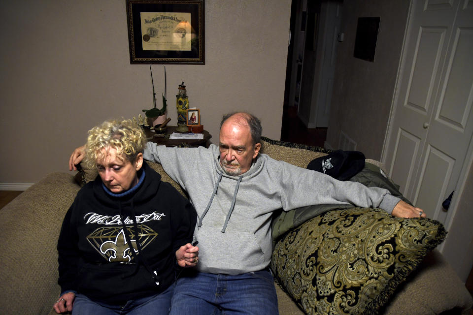 Jeff and Sabrina Aston sit in their Colorado Springs, Colo., home on Sunday, Nov. 20, 2022. The couple's 28-year-old son, Daniel Aston, was one of five people killed when a gunman opened fire in a gay nightclub in Colorado Springs on Saturday night. (AP Photo/Thomas Peipert)