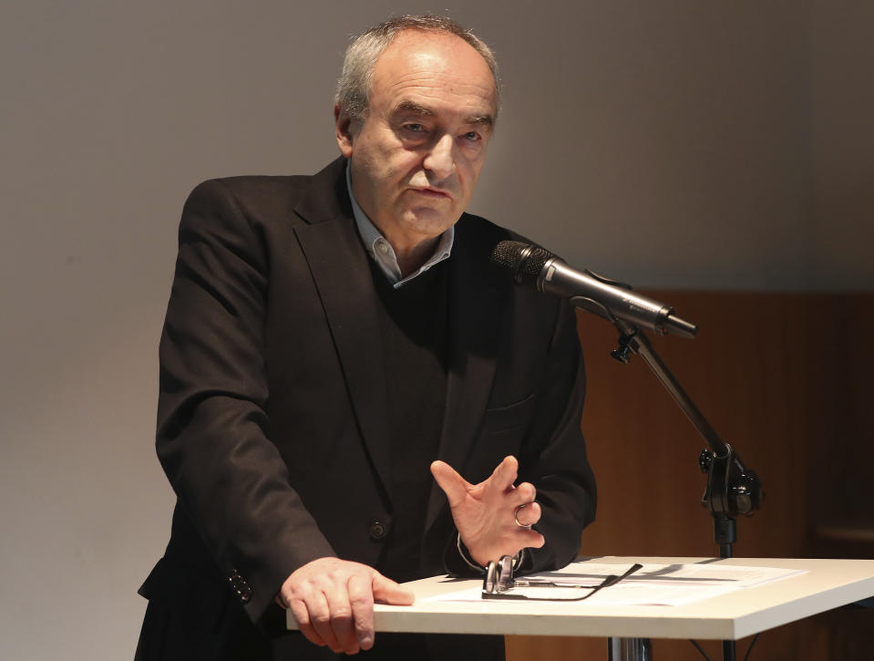 The new director of Poland's landmark POLIN museum of Jewish history, Zygmunt Stepinski, is addressing reporters to vow the museum's independence and continuation of mission following a yearlong stalemate with the government, at the POLIN museum, in Warsaw, Poland, Friday, Feb. 28, 2020. (AP Photo/Czarek Sokolowski)