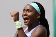 Coco Gauff of the U.S.celebrates her win over Estonia's Kaia Kanepi during their third round match of the French Open tennis tournament at the Roland Garros stadium Friday, May 27, 2022 in Paris. Gauff won 6-3, 6-4. (AP Photo/Christophe Ena)