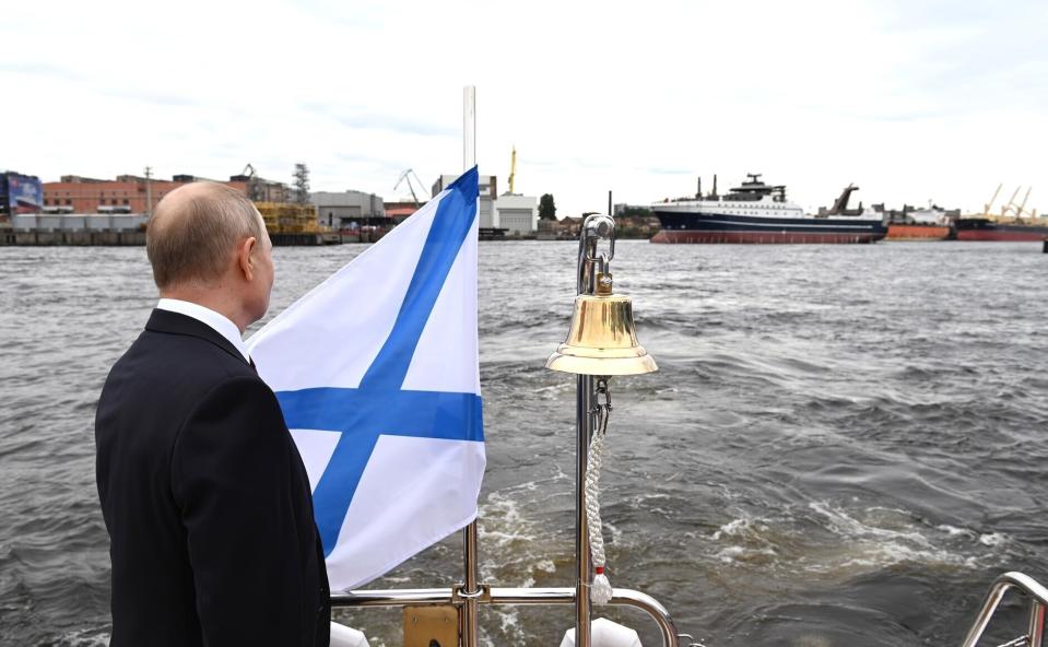 In this photo provided by the Kremlin, Vladimir Putin attends the launch ceremony for Mekanik Sizov, a super trawler belonging to a company partly owned by sanctioned businessman Gleb Frank in St. Petersburg, Russia. A U.S. ban on seafood imports from Russia over its invasion of Ukraine was supposed to sap billions of dollars from Vladimir Putin’s war machine. But shortcomings in import regulations means that Russian-caught pollock, salmon and crab are likely to enter the U.S. anyway, by way of the country vital to seafood supply chains across the world: China. (The Kremlin via AP) (The Kremlin via AP)
